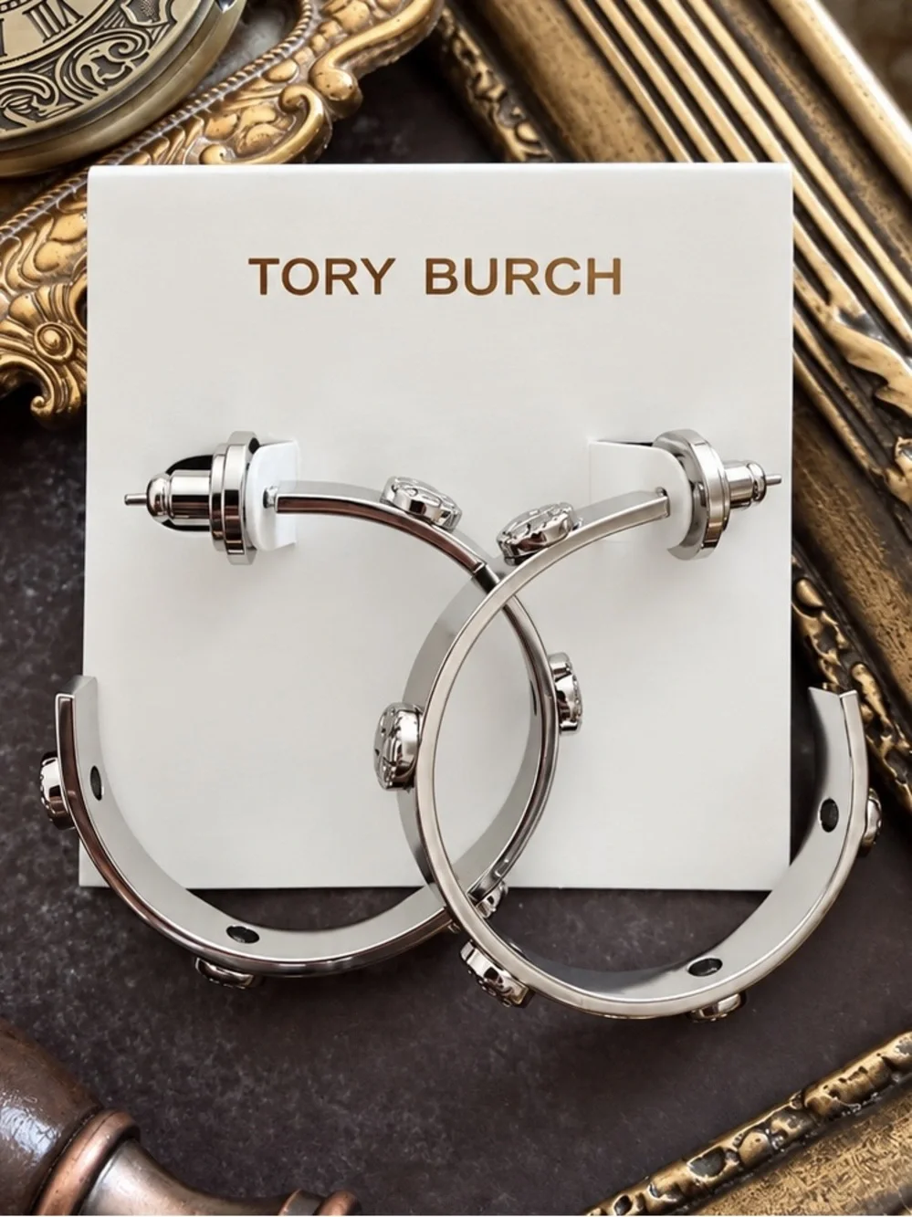 TORY BURCH • Silver Milgrain Logo Hoop Earrings Includes Tory Burch Jewelry Bag